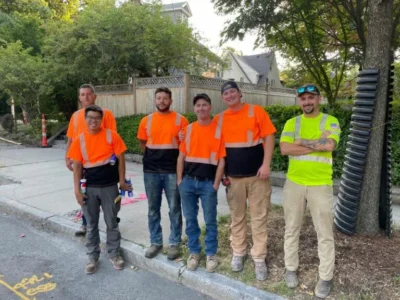 Deroma Construction Team working together on a street construction project.